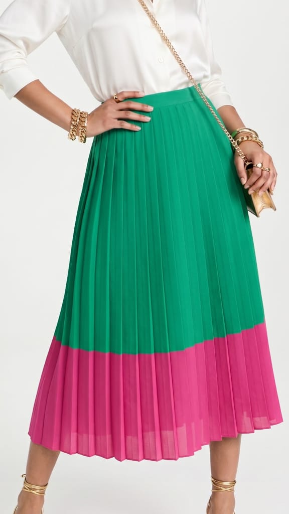 Gonna plissé piatto verde e rosa, effetto geometrico pieghe verticali moda donna