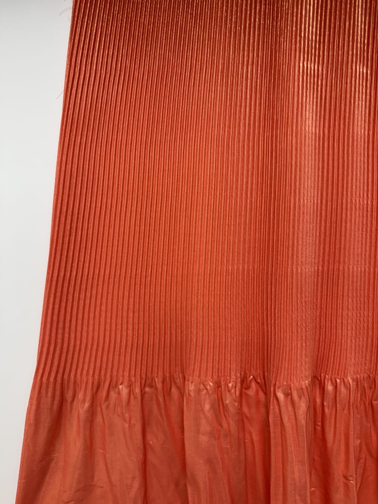 Plissé organetto arancio gonna, pieghe verticali uniformi ed elastiche 