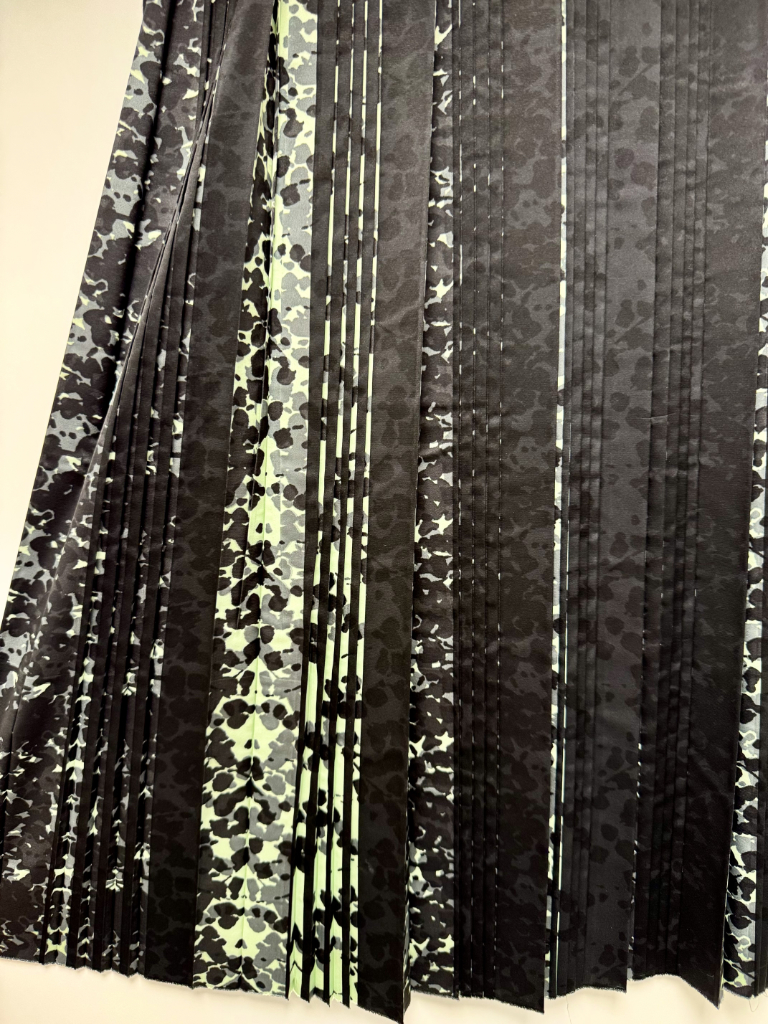 Stampa sublimatica verde su plissé organetto 